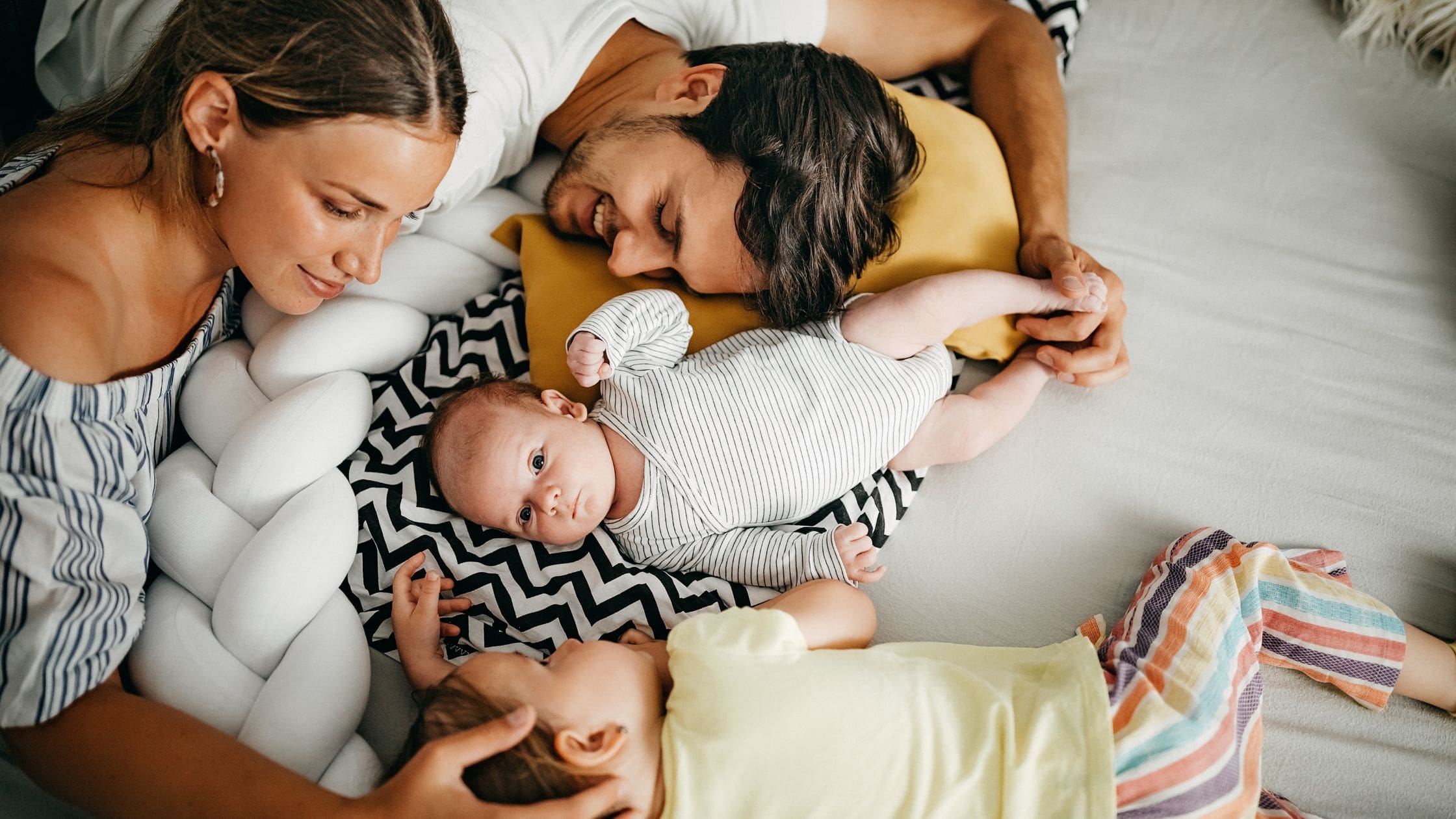 father appreciating his family. father, mother and 2 kids