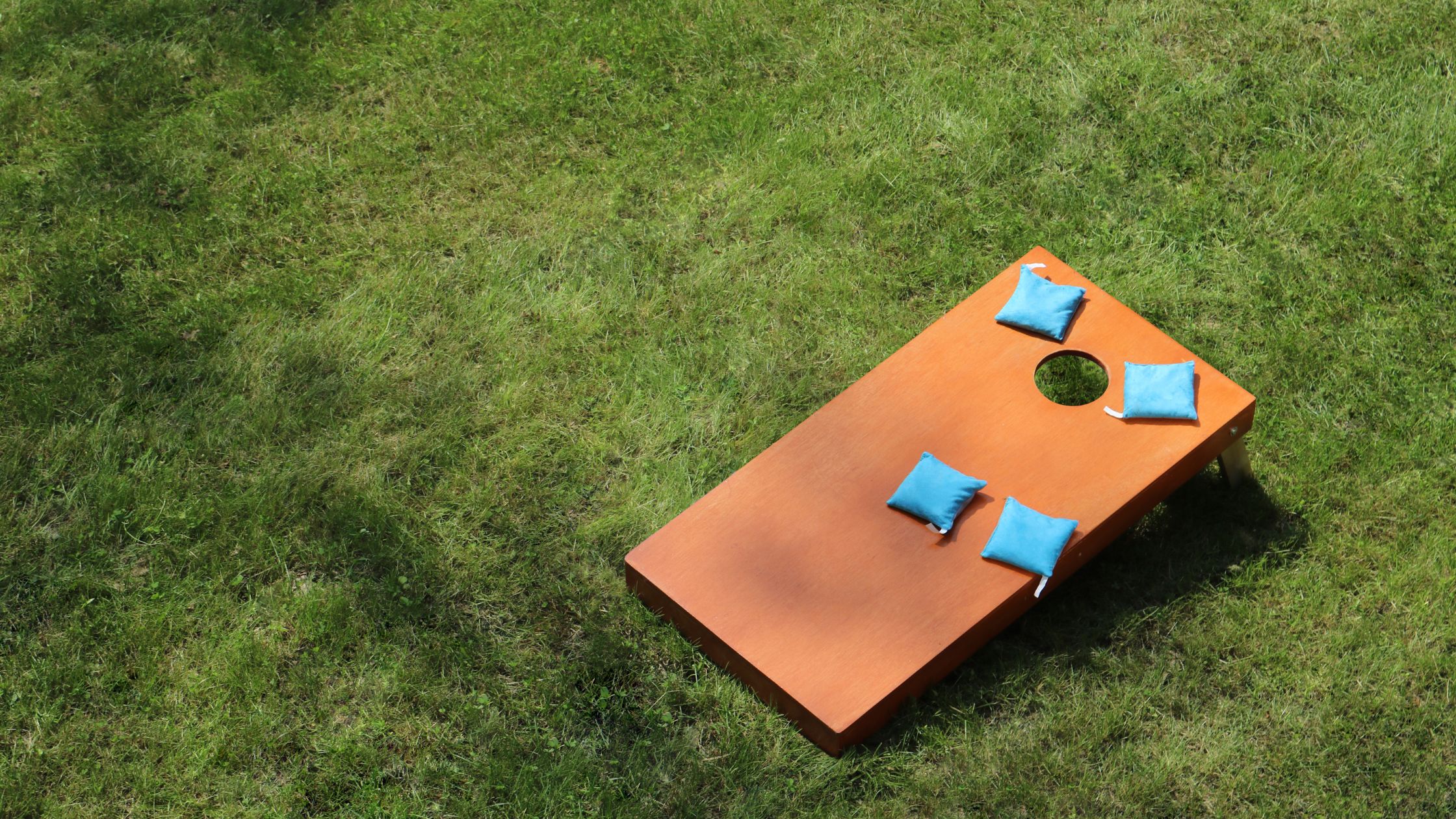 Play pumpkin bean bag toss