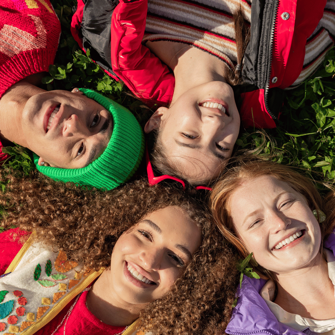Klok your special moments like: A group of teenage friends laughing in a park.